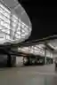 This architectural photograph showcases the interior of an industrial building with a modern design.
