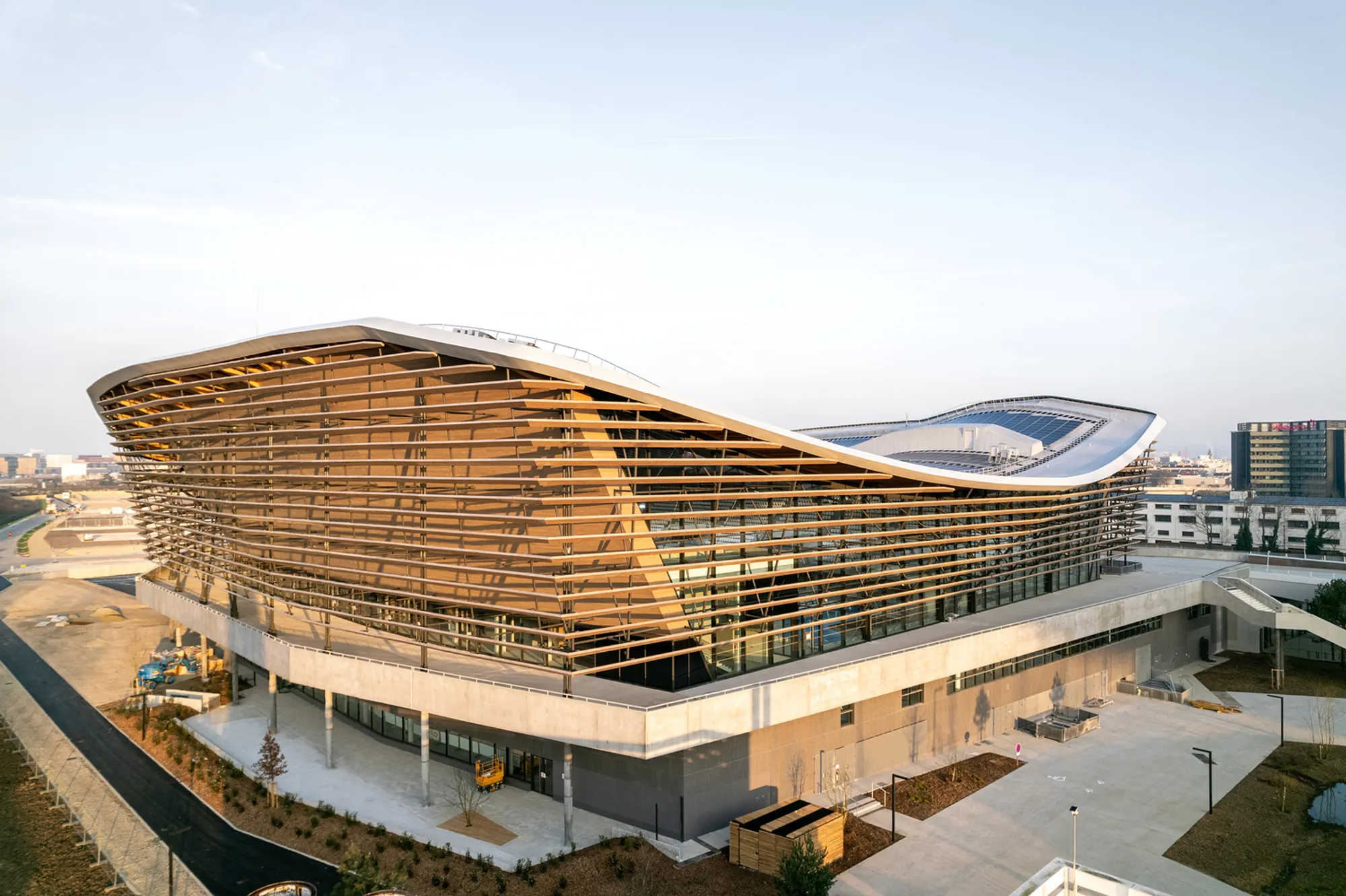 Aquatics Centre Paris by VenhoevenCS and Ateliers 2/3/4/: A Landmark of Sustainable Sports Architecture