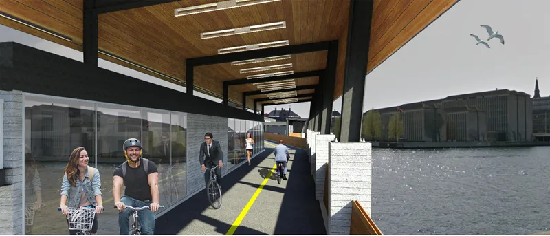 Dedicated bike path integrated within a sustainable urban bridge design.