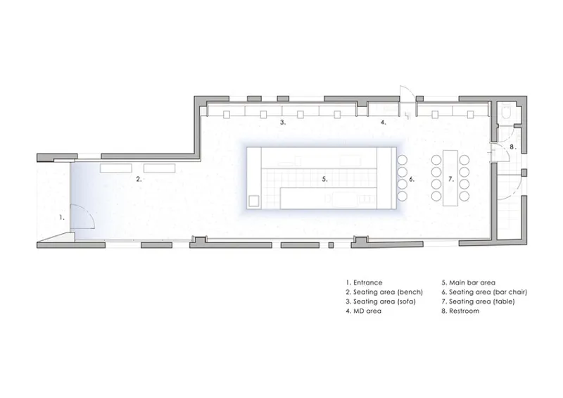 Floor plan drawing showing entrance, seating zones, bar area, and restroom in a narrow layout