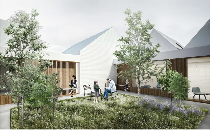 Central courtyard garden fostering intergenerational interaction and quiet reflection.