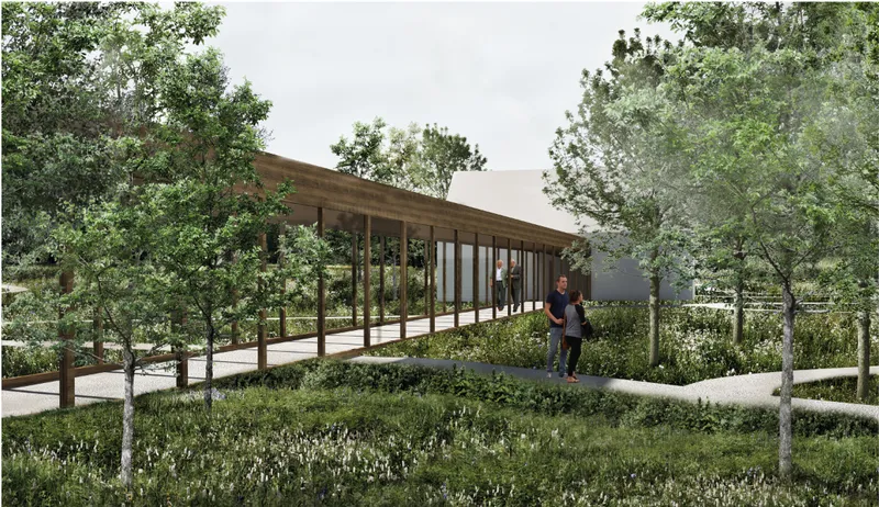 Timber-covered walkway connecting care facilities through therapeutic green spaces.