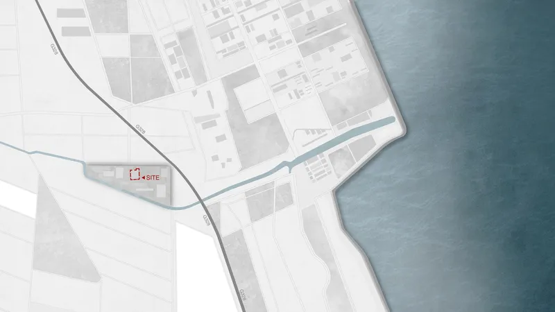 Site plan drawing showing a waterfront parcel bordered by a curving road and canal