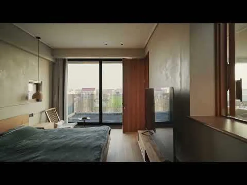 Bedroom with textured plaster walls, sliding glass doors to a balcony and timber divider panel