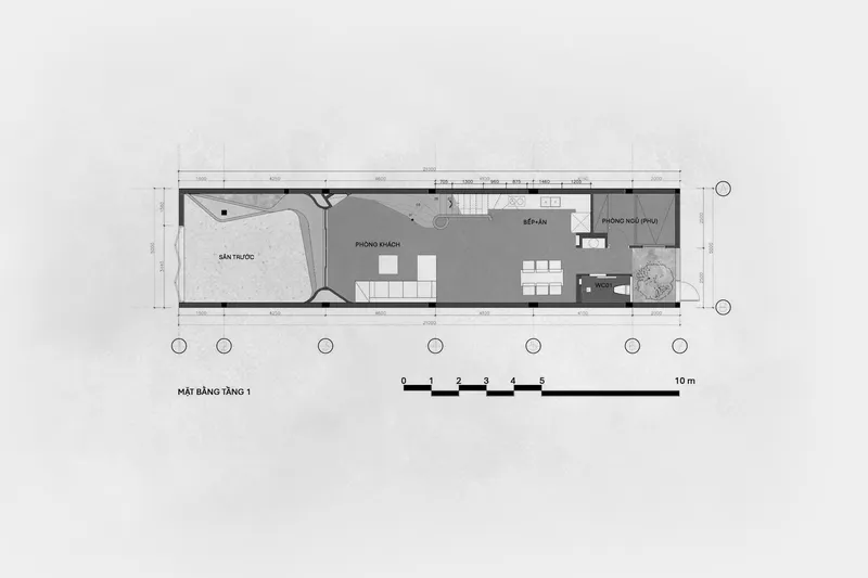 Floor plan showing a courtyard entry, open living and dining area, and kitchen service wing
