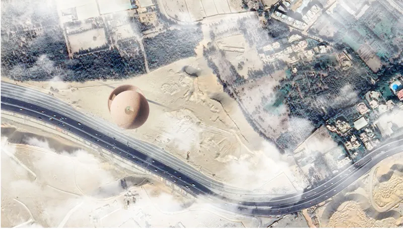 Aerial view reveals isolated placement of the memorial within urban and desert edge conditions