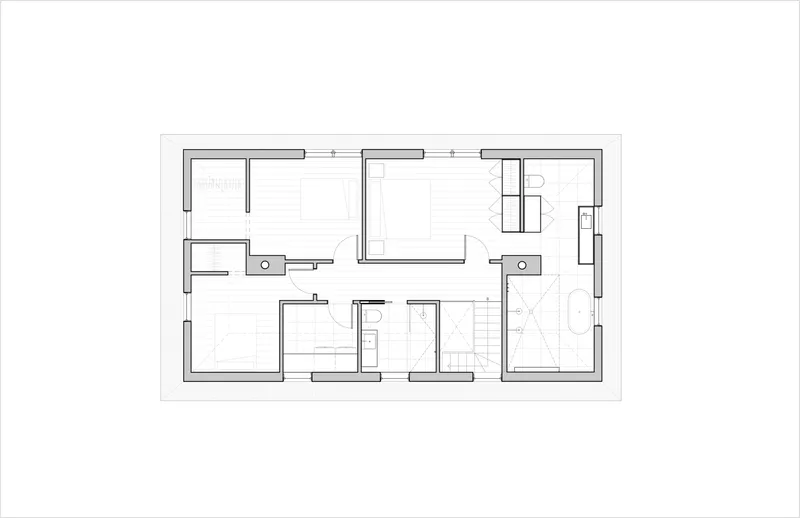 Upper floor plan drawing depicting bedrooms, bathrooms and a central staircase with hallway