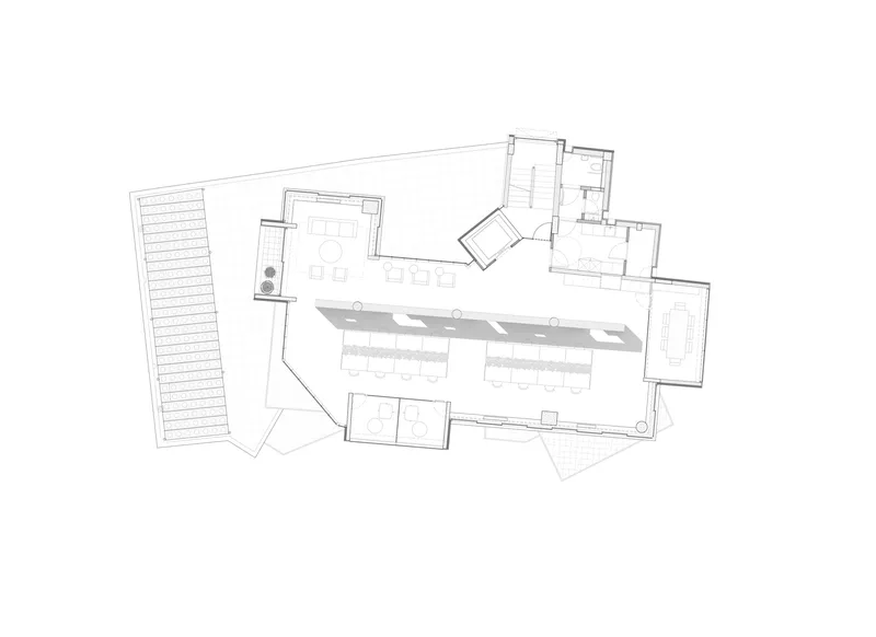 This architectural image presents a floor plan, likely for a combined office and residential space. The design incorporates an open floor plan with distinct zon