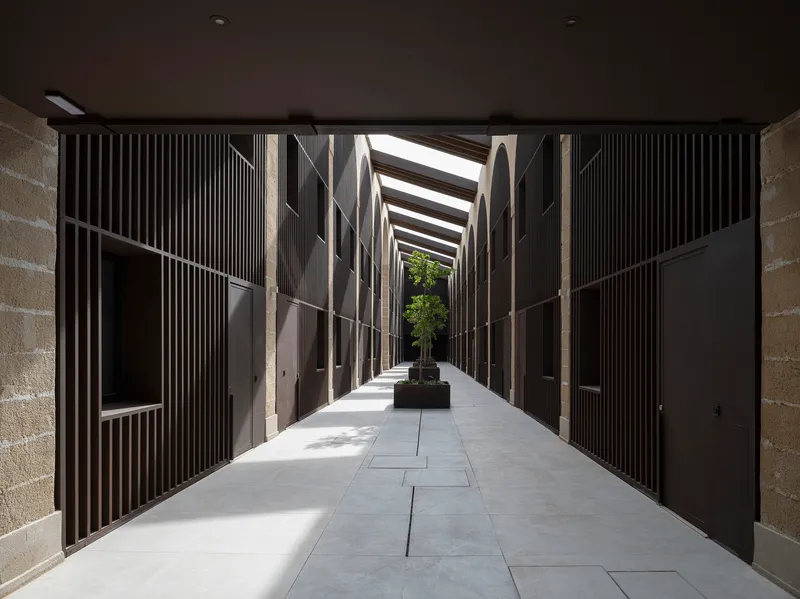 Covered passage running between the residential blocks