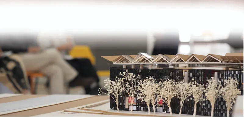 Physical model showcasing the layered façade and fragmented roof geometry of the Banned Book Library