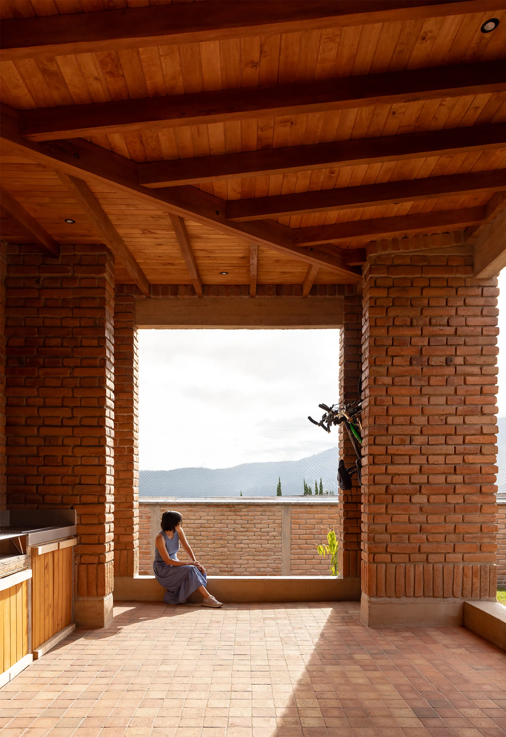 Arupo House: Brick, Courtyard, and Volcano Views