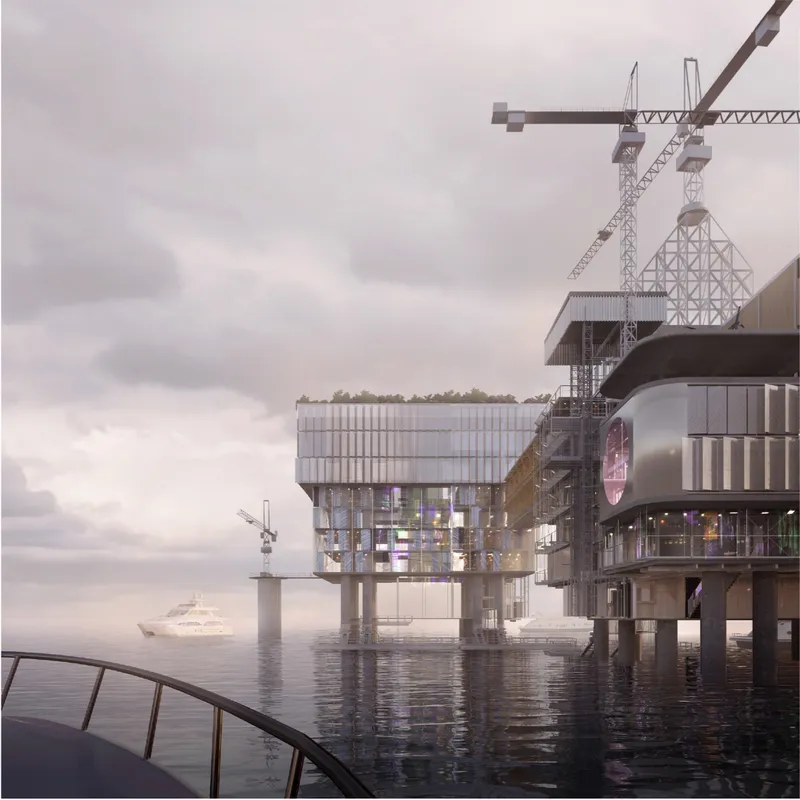 Industrial structures evolve into cultural infrastructure, merging marine context, adaptive reuse, and contemporary architectural living.