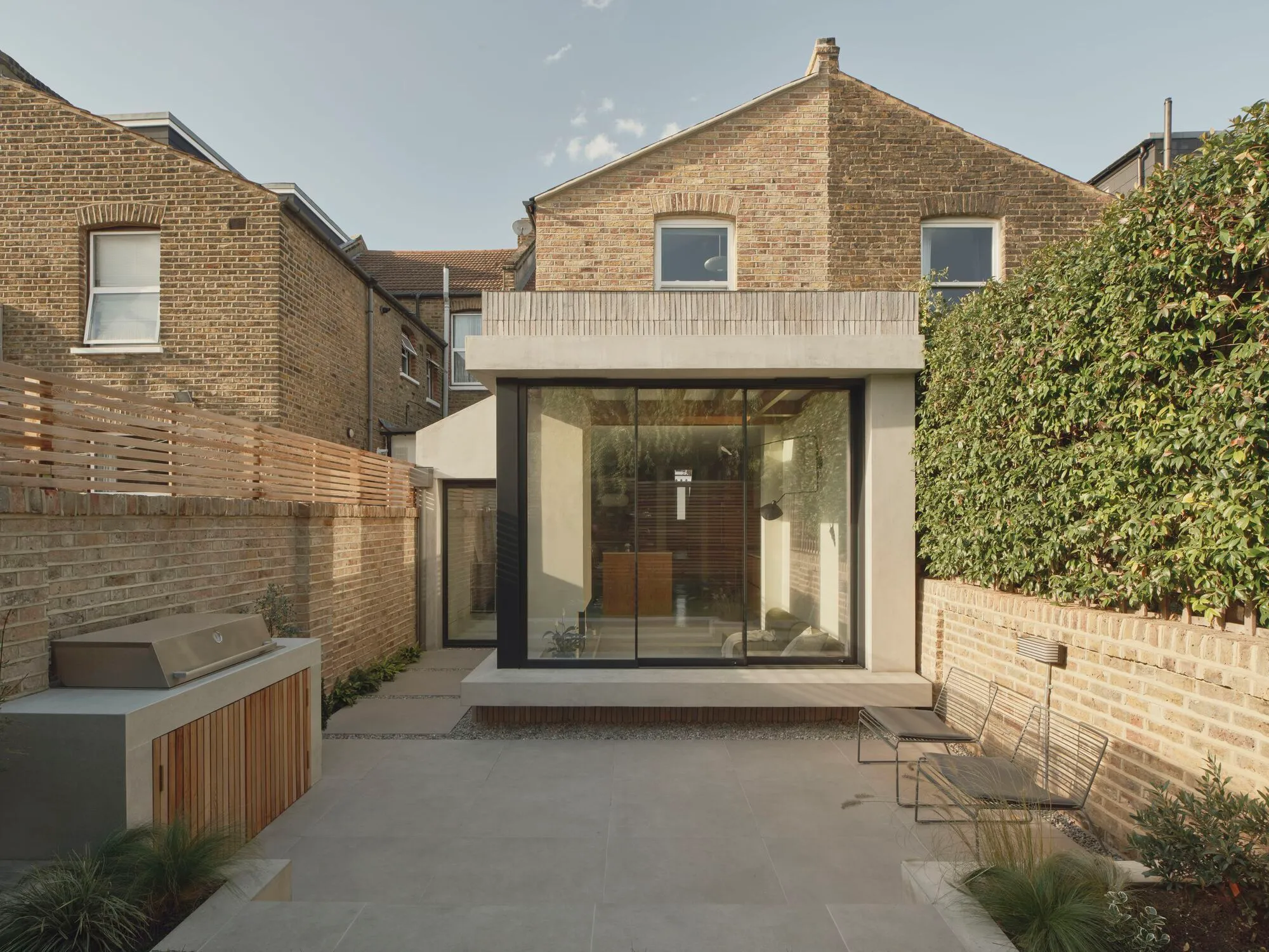 Loggia House: A Sunken Garden Extension Redefining Family Living and Indoor: Outdoor Connection