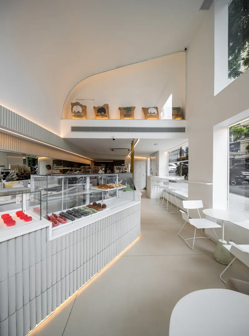 We Coffee Jardins by BYN Studio + ENTRE Arquitetos