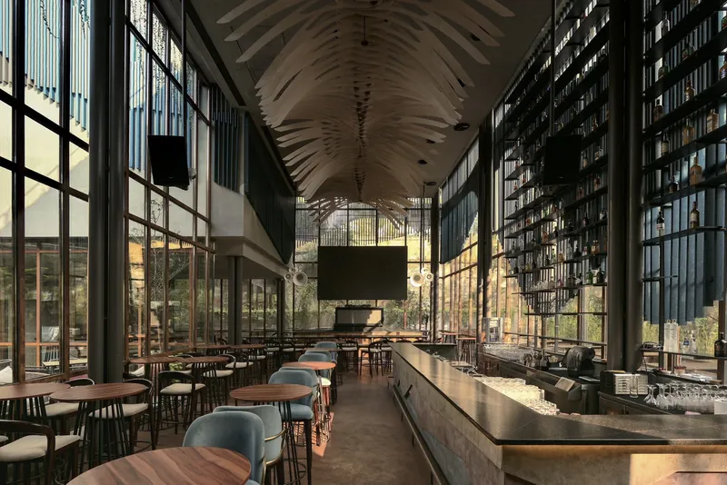 Interior bar space with undulating timber ceiling, floor-to-ceiling glazing and bottle display wall at dusk