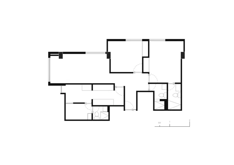 Floor plan drawing showing an apartment layout with open living spaces and service zones