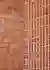 This architectural image showcases a brick facade with a unique design. The wall is constructed with