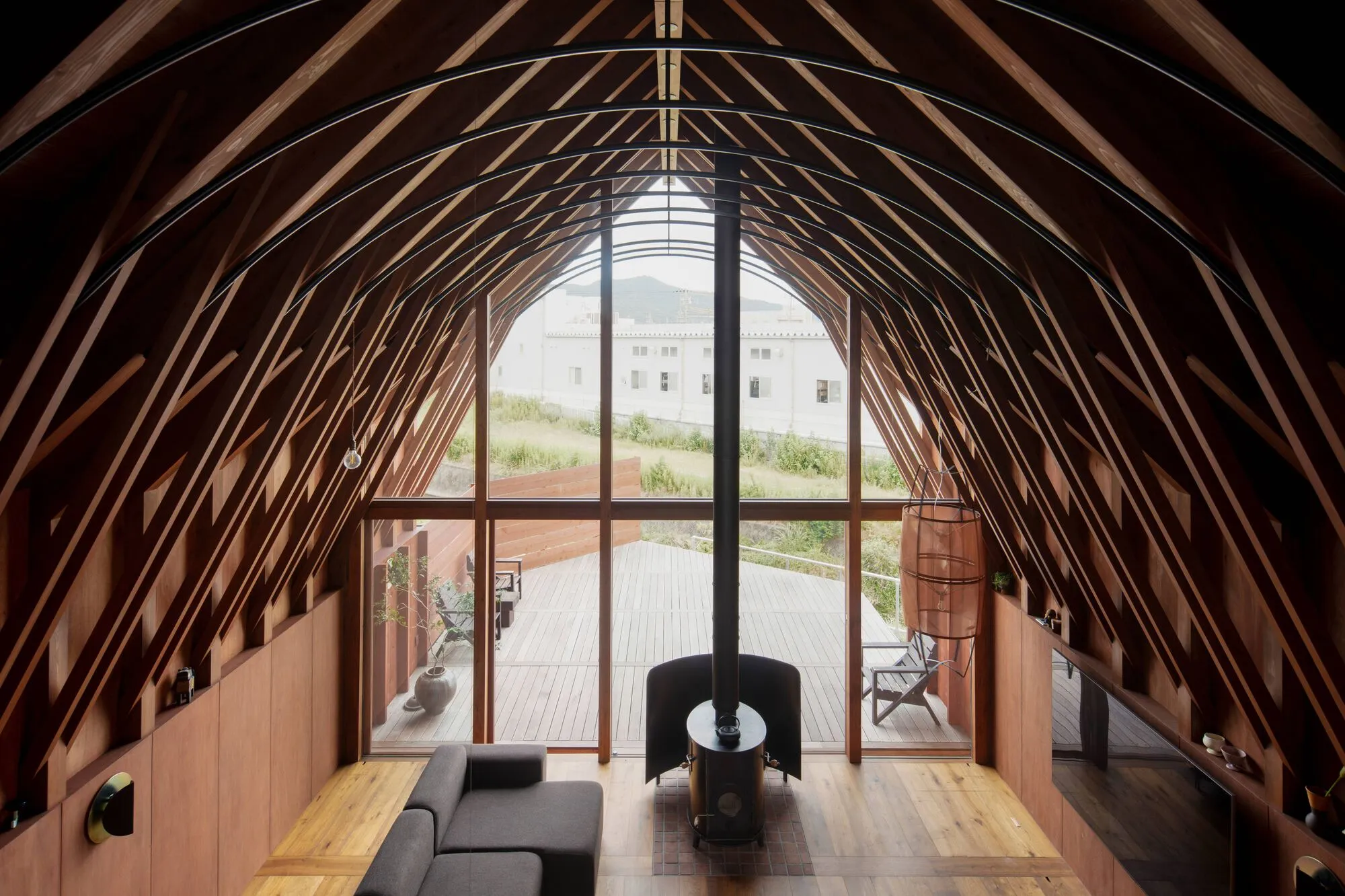 A House of Two Barns on a Flag-Shaped Plot