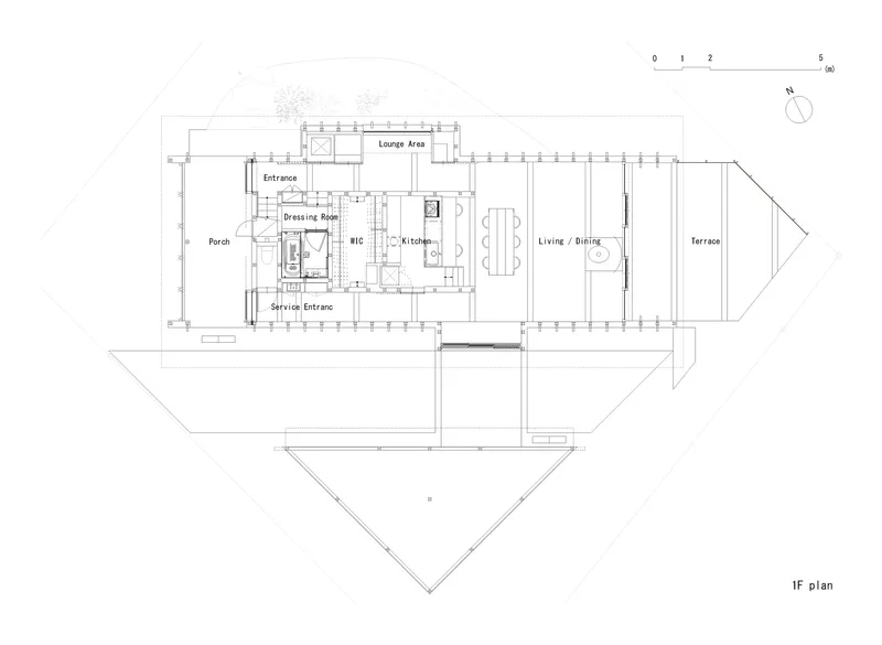 First floor plan showing kitchen and living areas with triangular terrace extending to the east