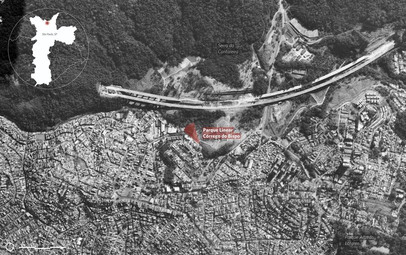 Aerial site plan showing the linear park highlighted in red cutting through dense urban fabric and forest