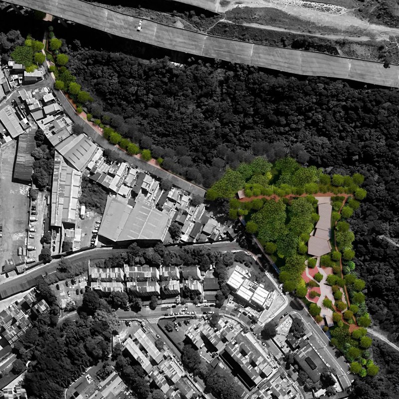 Aerial view showing the landscaped pavilions and pathways highlighted in color against monochrome surrounding neighborhoods
