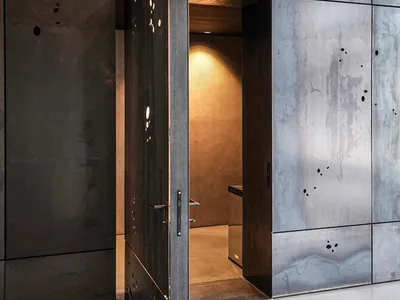 Industry Meets Design: Steel Pivot Doors Transform a Modern Production Hall in Austria