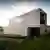 House_JA: A Concrete Horizon House Framing Landscape, Privacy, and Panoramic Living