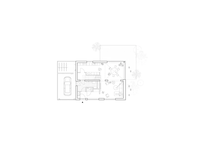 Ground floor plan drawing showing open living spaces, carport, and central staircase with furnishings indicated