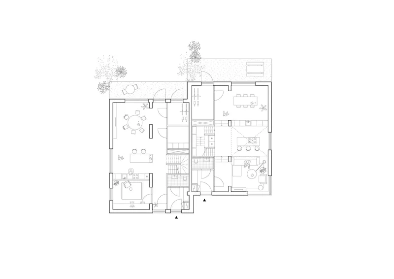 Floor plan drawing of a single-family dwelling with central staircase and adjacent garden with trees