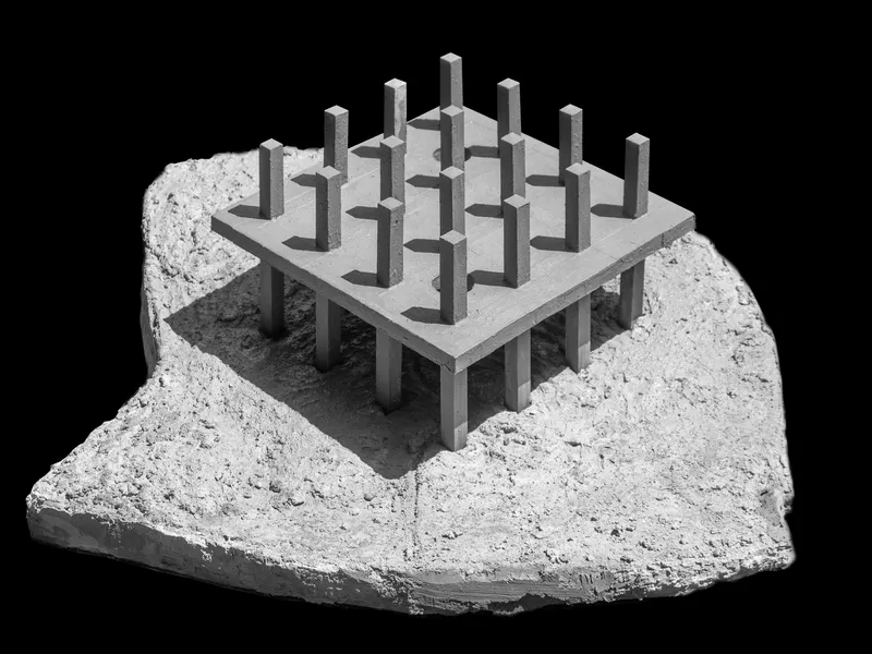 Physical model of the pavilion structure mounted on a fragment of rough limestone