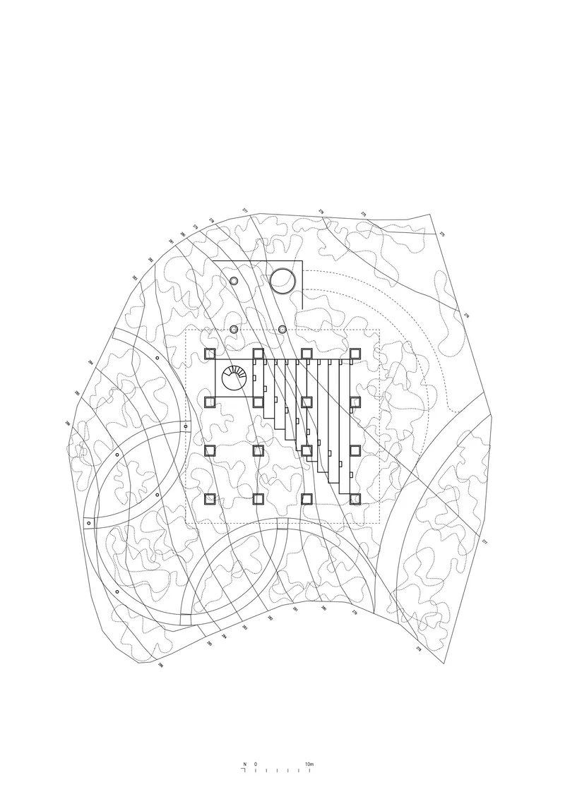 Site plan drawing showing a building footprint surrounded by contoured landscape paths and vegetation patterns