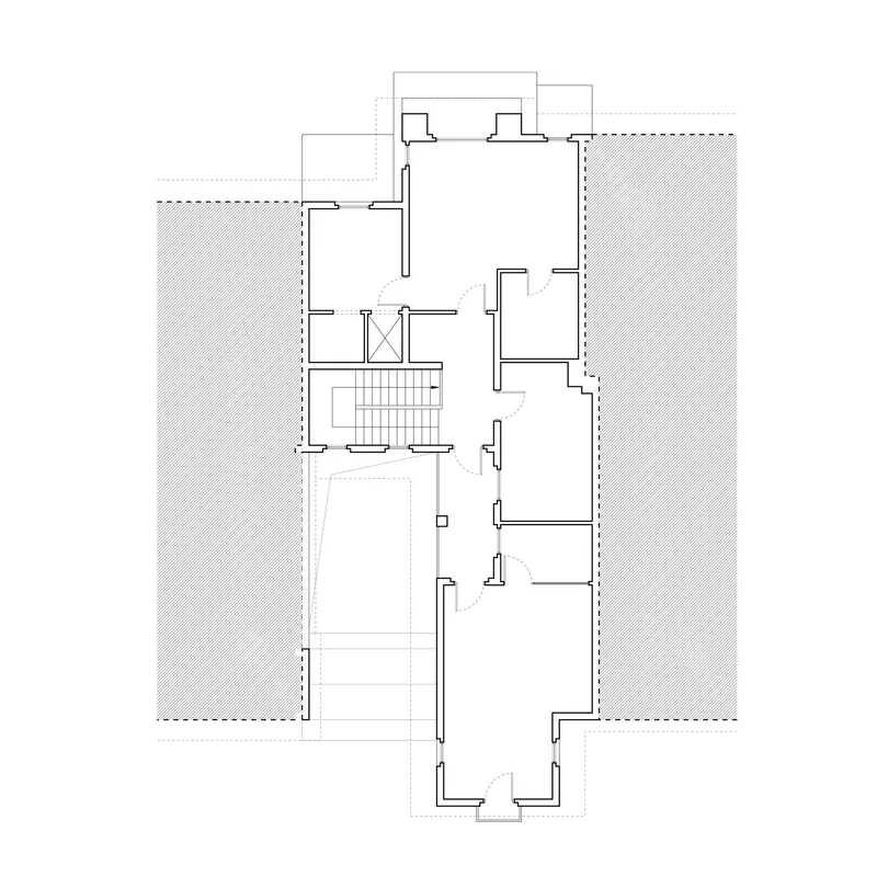 Upper floor plan drawing depicting a staircase with surrounding rooms and balconies