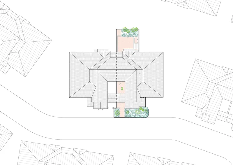 Site plan drawing showing a symmetrical roof with hipped forms and planted courtyards among neighboring structures