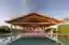 House MM Stretches a Timber Roof Across the Quiet