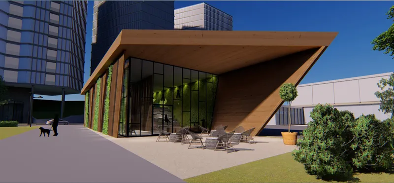 Urban café terrace creating a seamless transition between interior comfort and outdoor interaction.