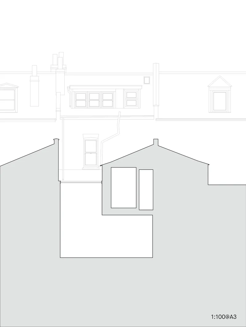 Elevation drawing showing the rear facade with chimney stacks and window openings between neighboring buildings