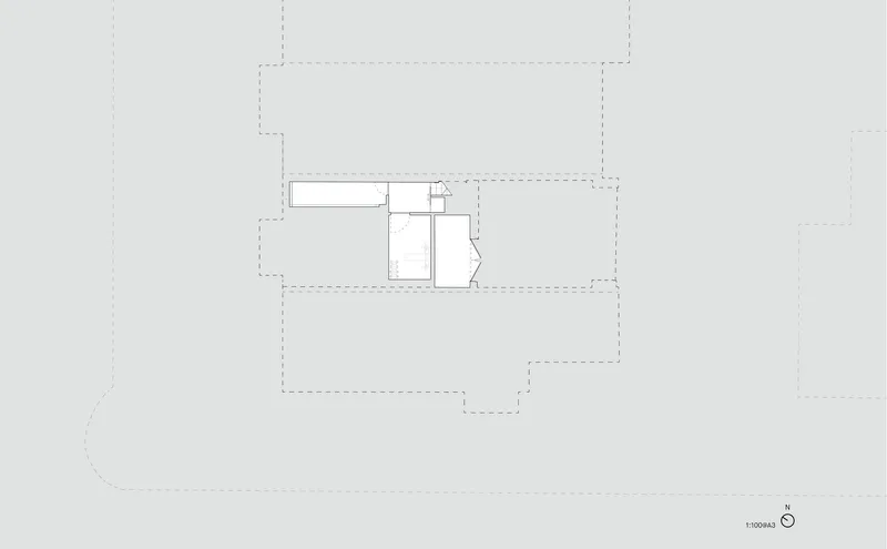 Upper level floor plan showing a compact core with bathroom and stair adjacent to surrounding terraces
