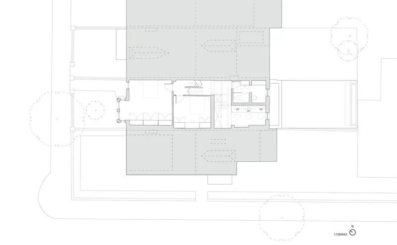 Floor plan drawing showing bedroom and bathroom volumes inserted within the central living zone