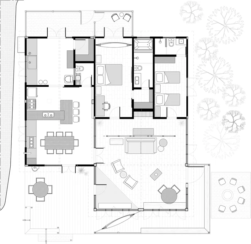 Floor plan drawing showing bedroom wing, kitchen, dining area, and covered terrace with surrounding trees
