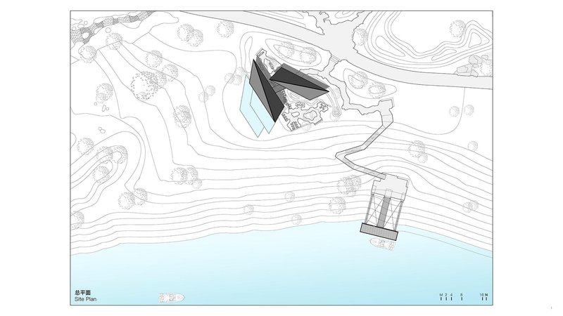 Site plan drawing showing two buildings amid topographic contours and a waterfront edge