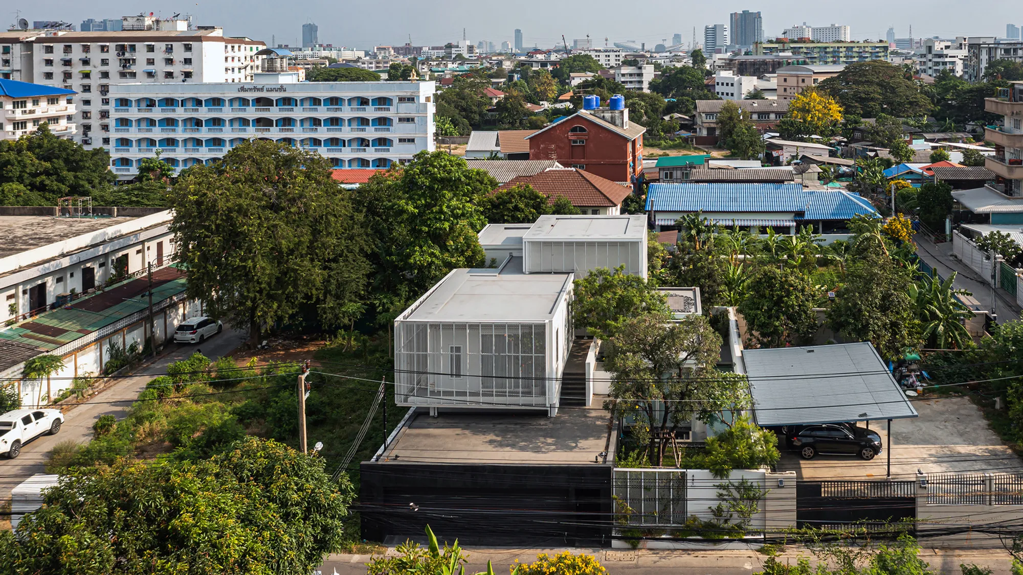 T+N House by Junsekino Architect and Design: An Industrial-Inspired Tropical Residence in Bangkok