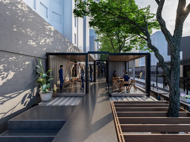 Adaptive reuse of shipping containers forms flexible social spaces for exhibitions, work, and everyday interaction.