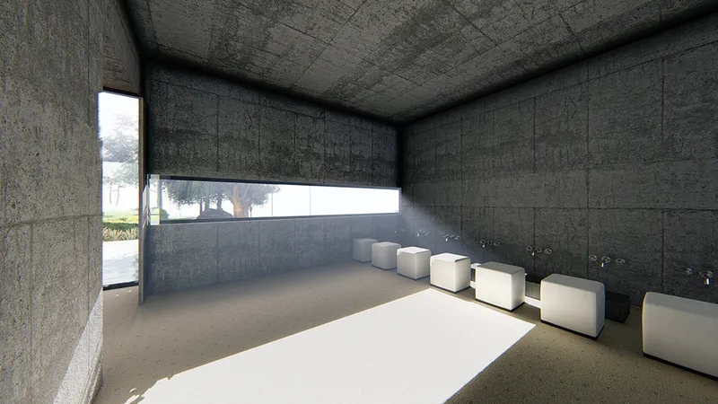 Soft daylight washes over raw concrete, transforming a minimal ablution space into a quiet moment of reflection and ritual.