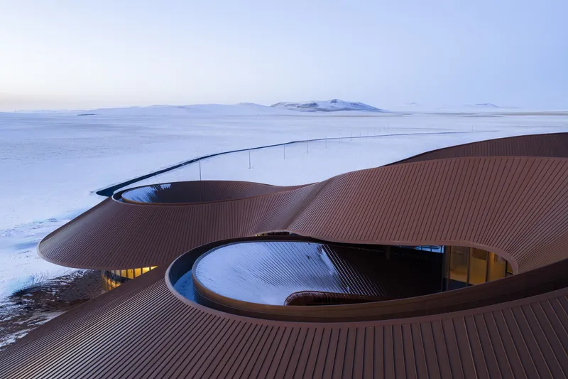 Rooftop view of the lobes meeting around a central skylit court