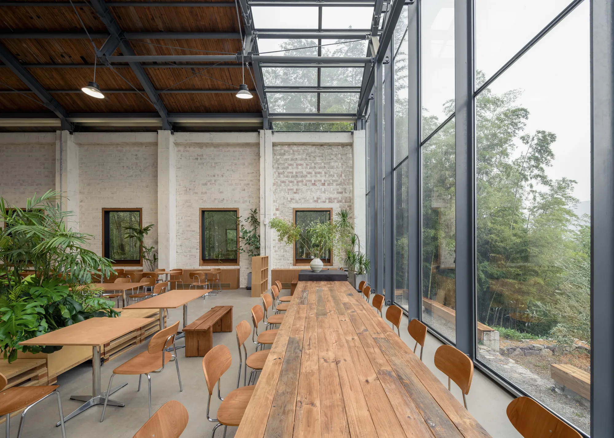 Tens Atelier and FANAF Turn a 1970s Chinese Village Auditorium into a Stone-Oven Bakery