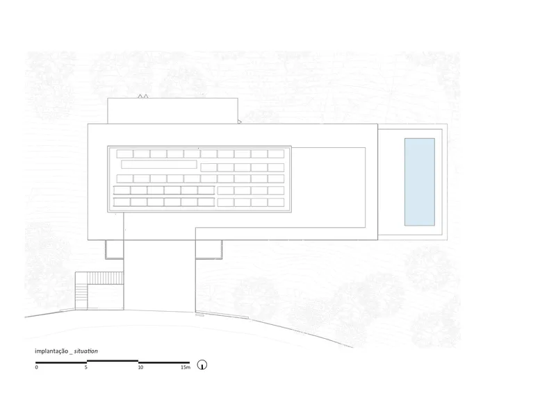 Site plan drawing showing a rectangular volume with a swimming pool on sloping terrain