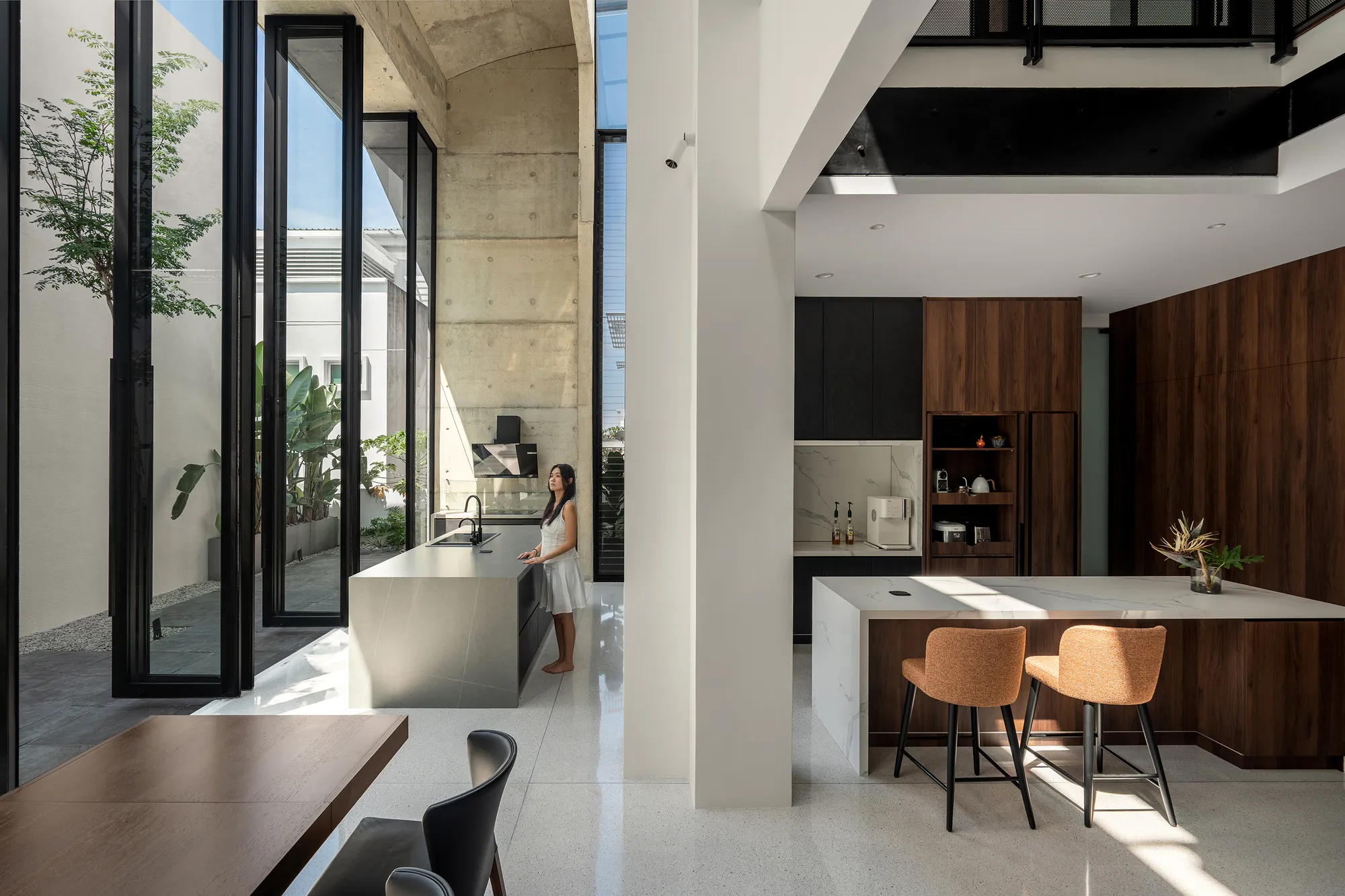 Core Design Workshop Carves Courtyards into a Zero-Lot Bungalow in Kuala Lumpur