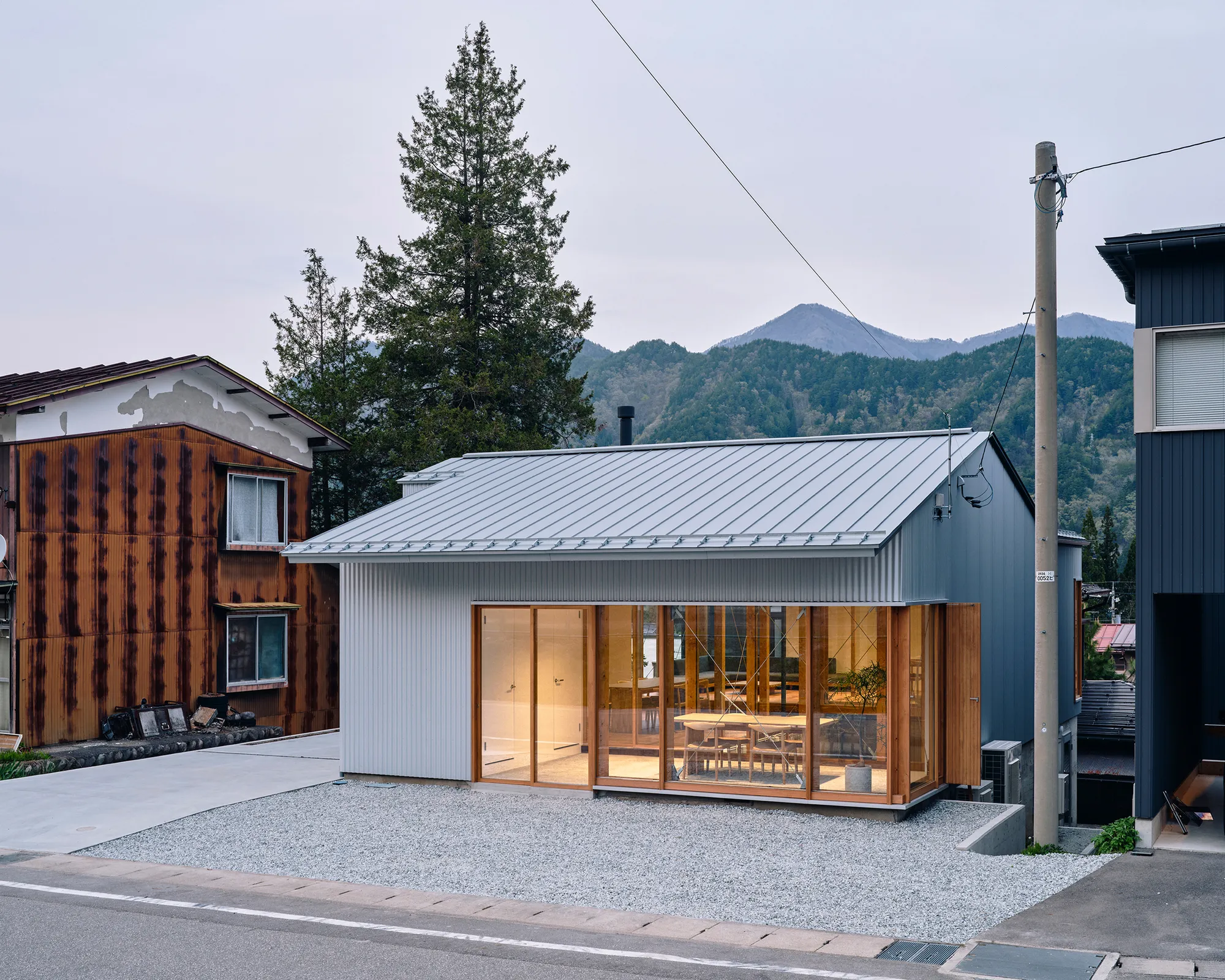 Kraft Architects Converts a Former Mining Town Building into a Split-Level Office in Rural Japan