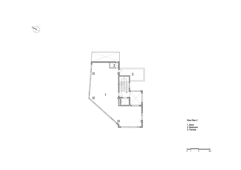 Floor plan drawing showing an angled main space with terrace and central stairwell