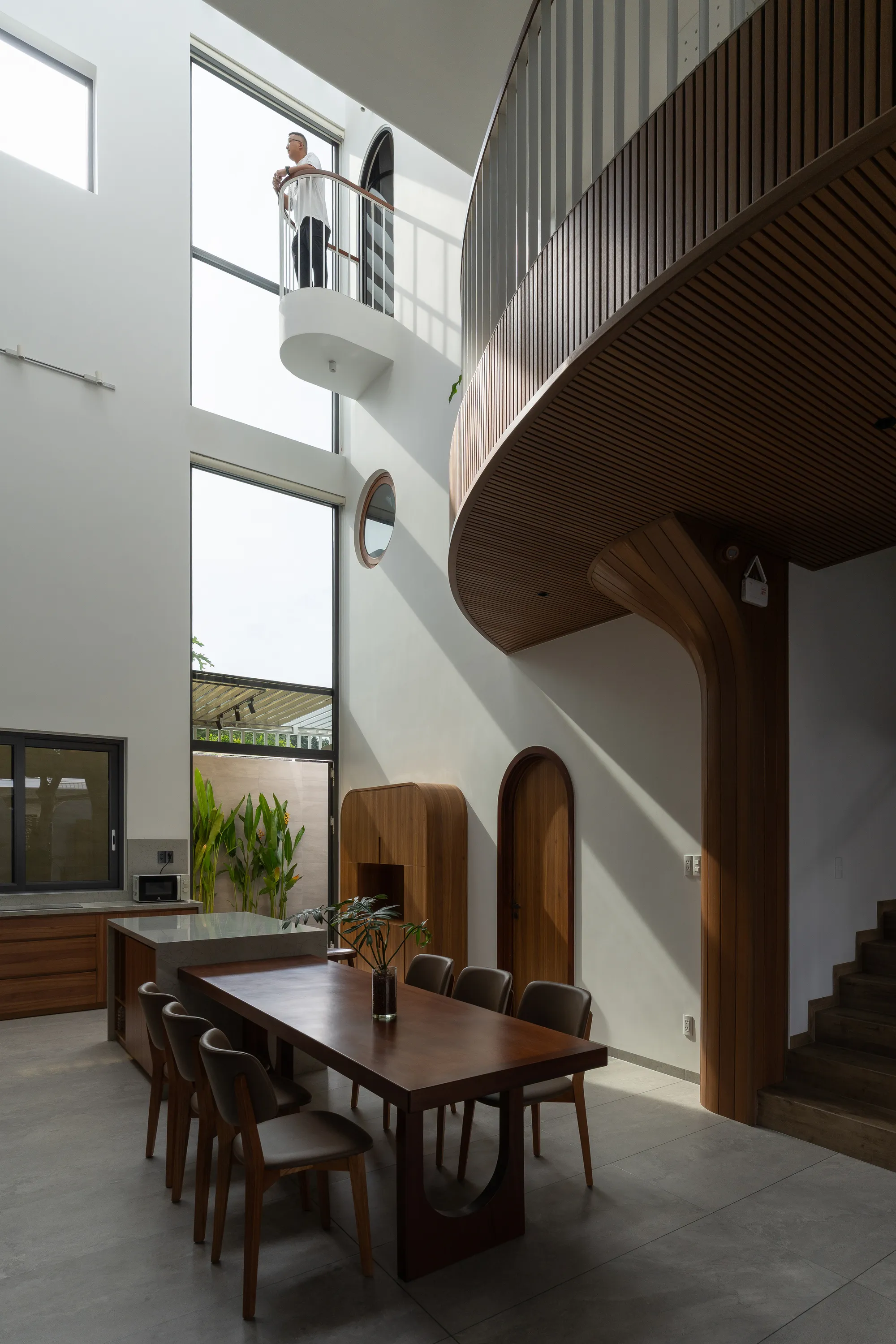 Story Architecture Shapes a Ho Chi Minh City House Around Vespa Curves and a Central Void